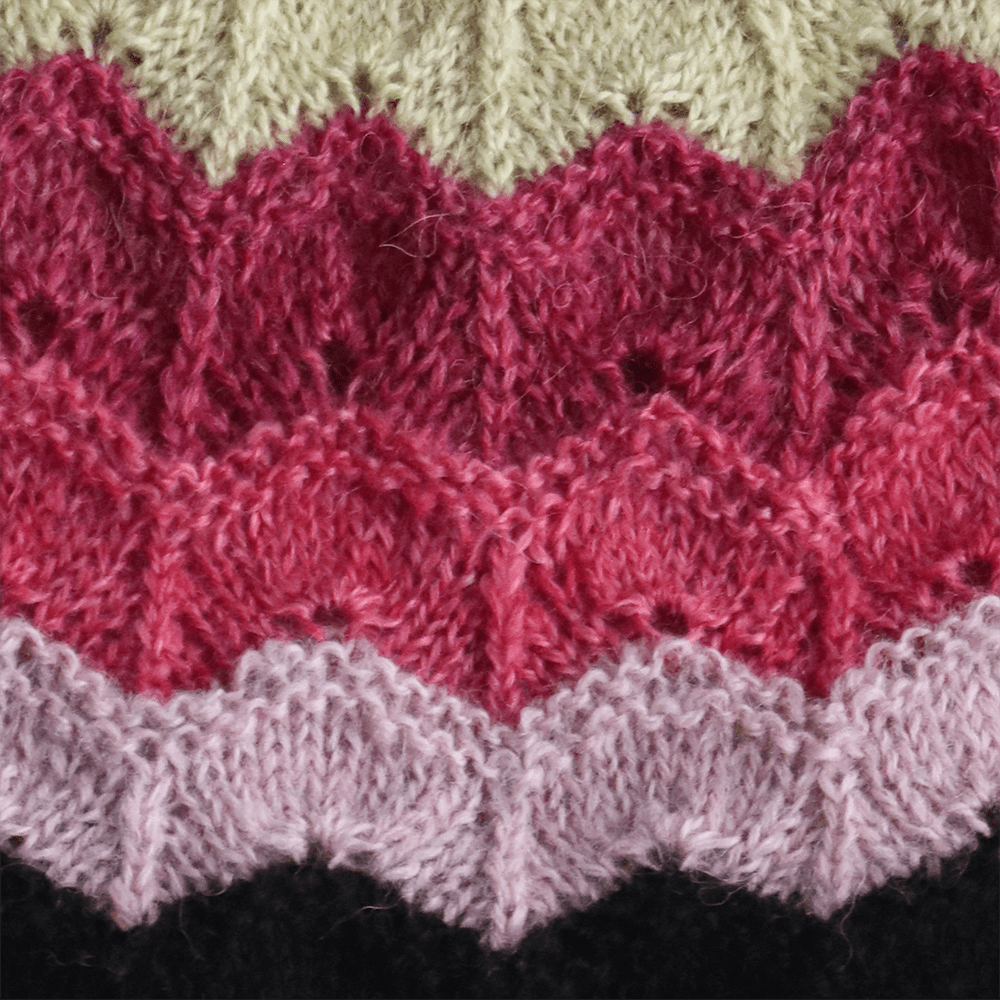 PFLknitwear.com Beanie baby alpaca natural dyed colors with pompom and embroidered flower. Made in Peru