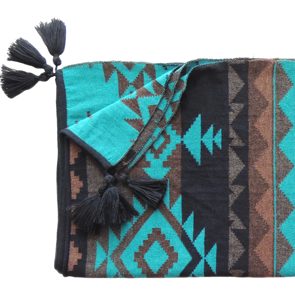 PFLknitwear.com Alpaca ruana wrap, jacquard knitted with pattern, with black tassels. made in Peru PFLknitwear.com Alpaca ruana wrap, jacquard knitted with pattern, with black tassels. made in Peru