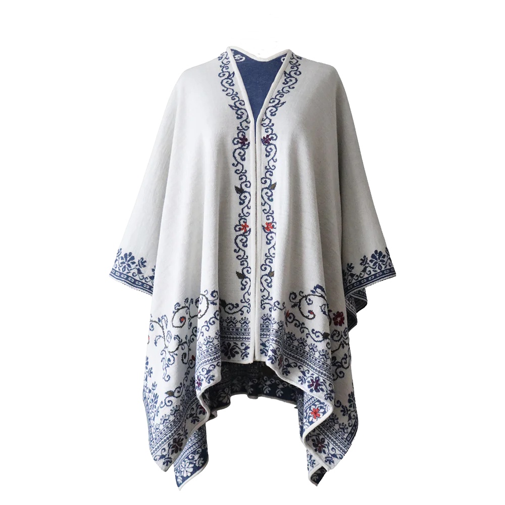 PFLknitwear.com Alpaca wrap reversible, jacquard knitted ruana with hand embroidered details, color white - blue Made in Peru