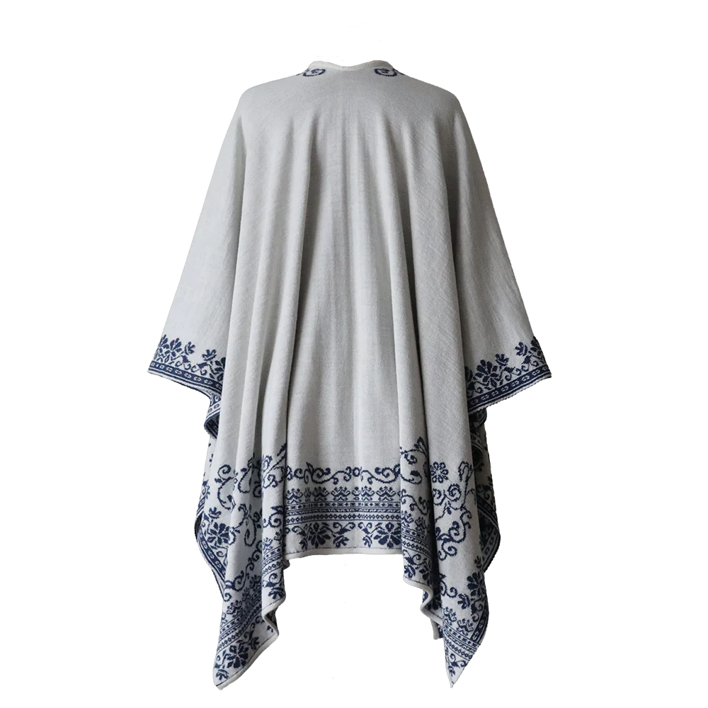PFLknitwear.com Alpaca wrap reversible, jacquard knitted ruana with hand embroidered details, color white - blue Made in Peru