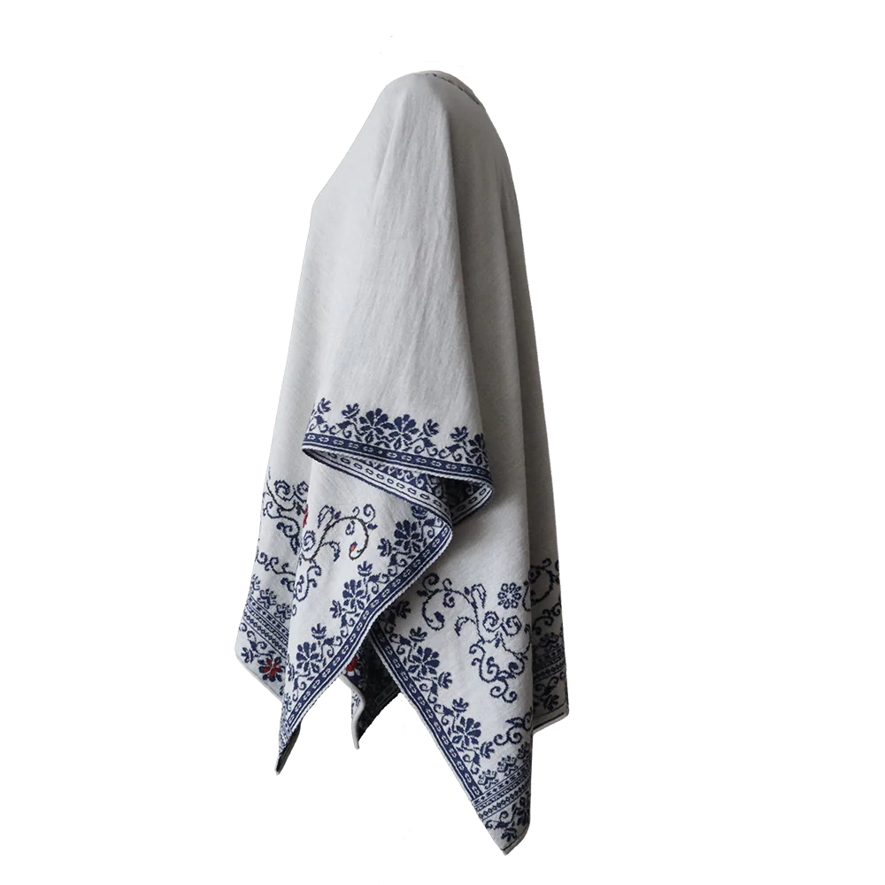 PFLknitwear.com Alpaca wrap reversible, jacquard knitted ruana with hand embroidered details, color white - blue Made in Peru
